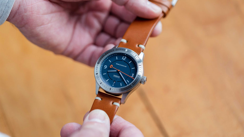 Person holding a watch