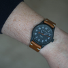 The Olsmsted Matte watch with a leather band