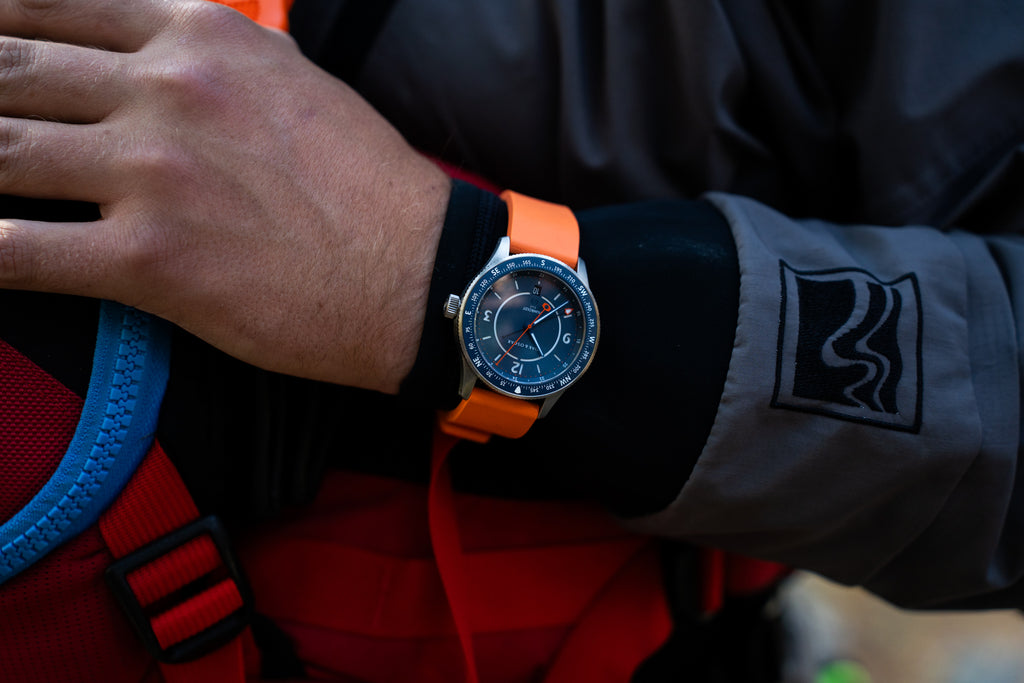 Oak & Oscar Humboldt SAR BWCA on orange rubber strap worn by rescue team member over dry suit